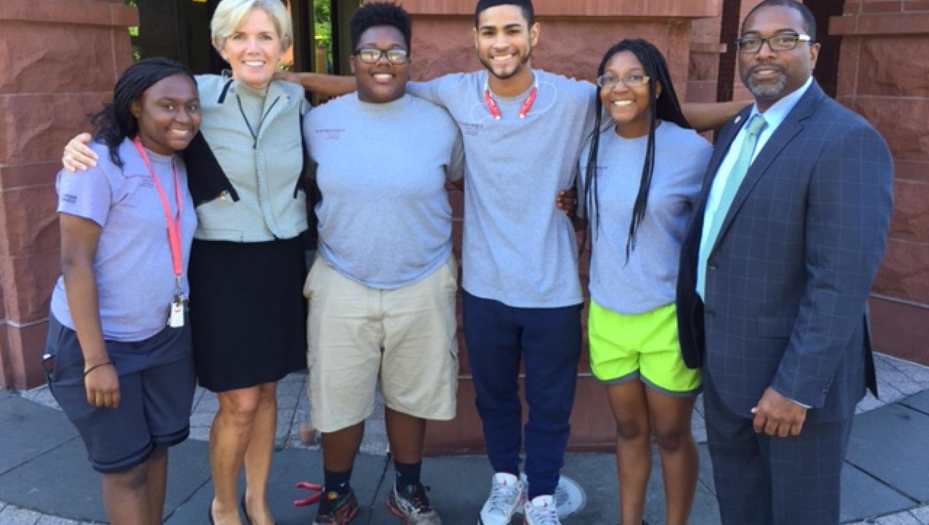 Summer Youth Employment participants pose with President Cooper. 