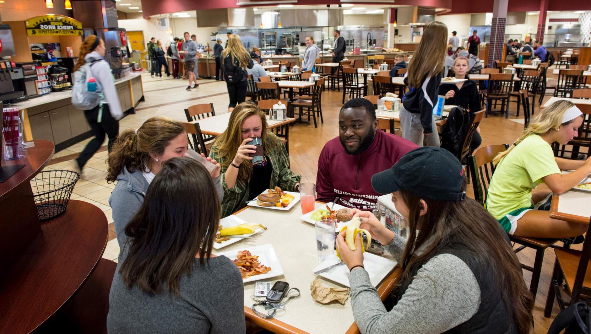 Students eating in Cheney Dining Hall. 