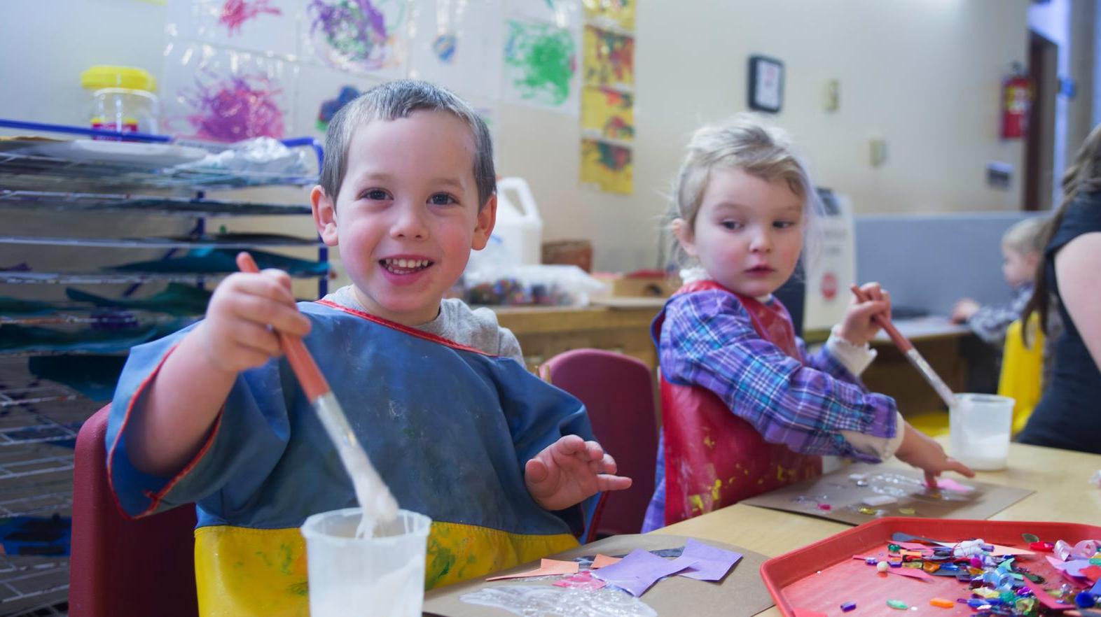 Happy kids doing crafts