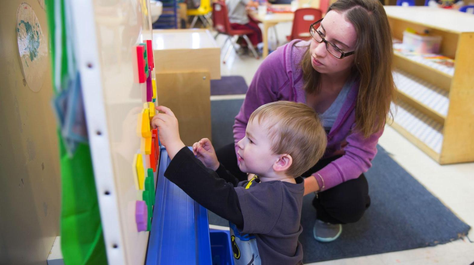 Certified teacher using the easel