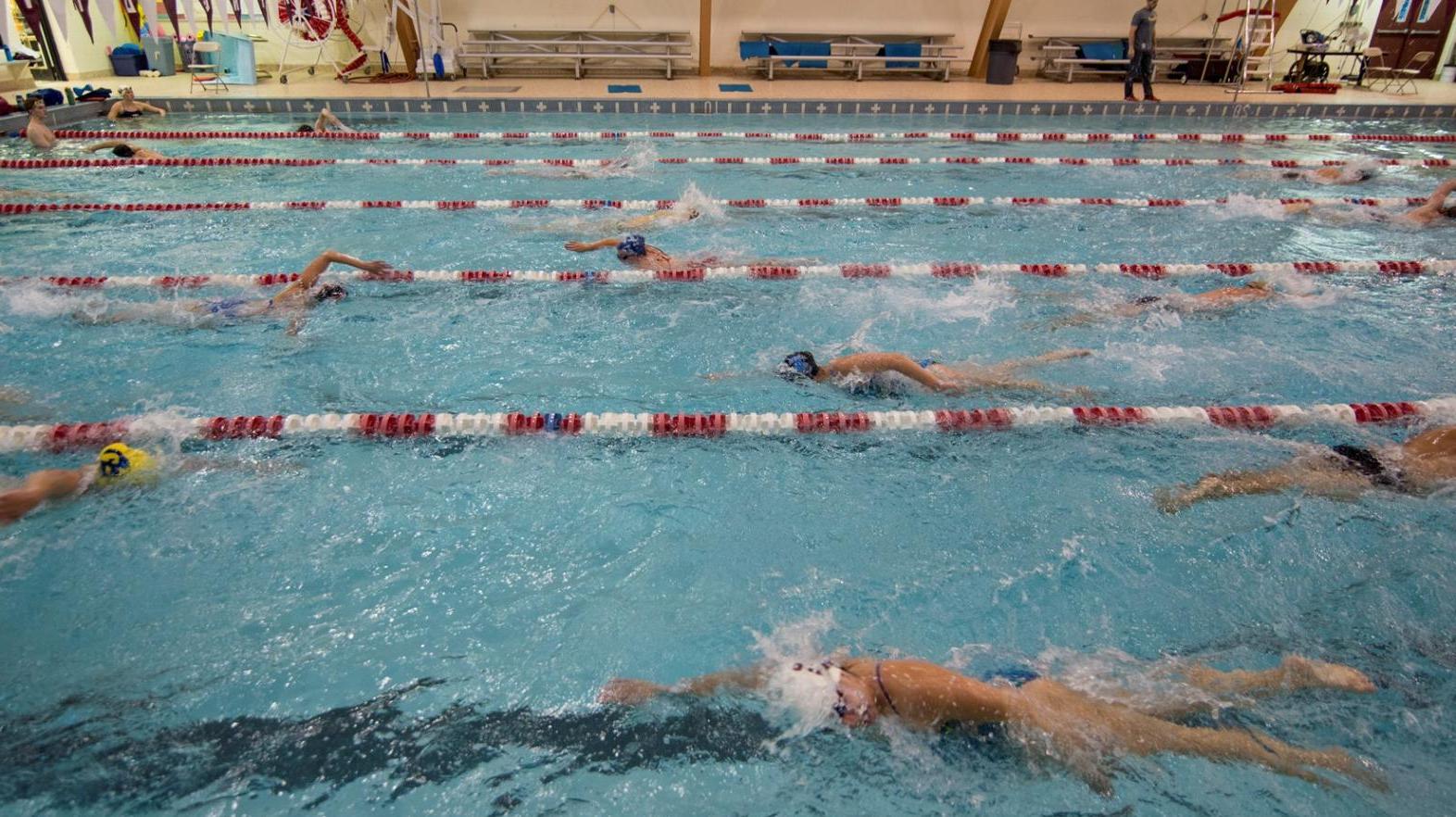 Members of the swim team take advantage of the Springfield College Art Linkletter Natatorium 