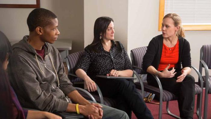 AmeriCorps students discussing resources